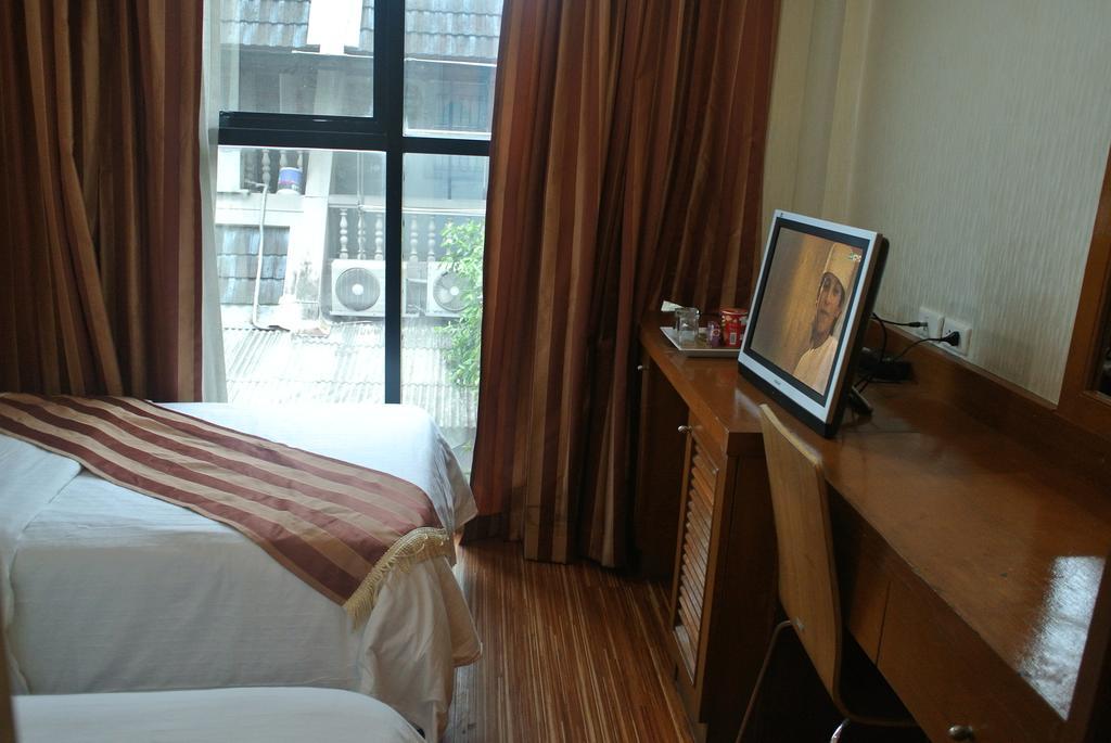 Sun City Hotel Bangkok Zimmer foto