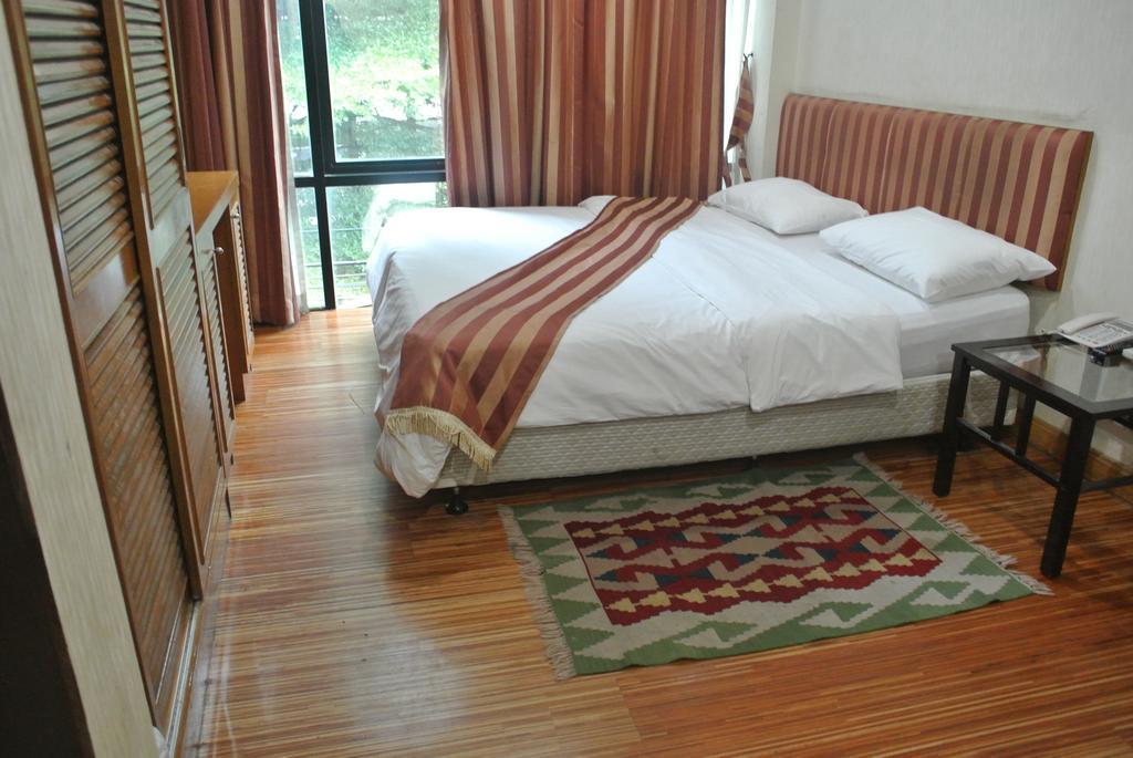 Sun City Hotel Bangkok Zimmer foto